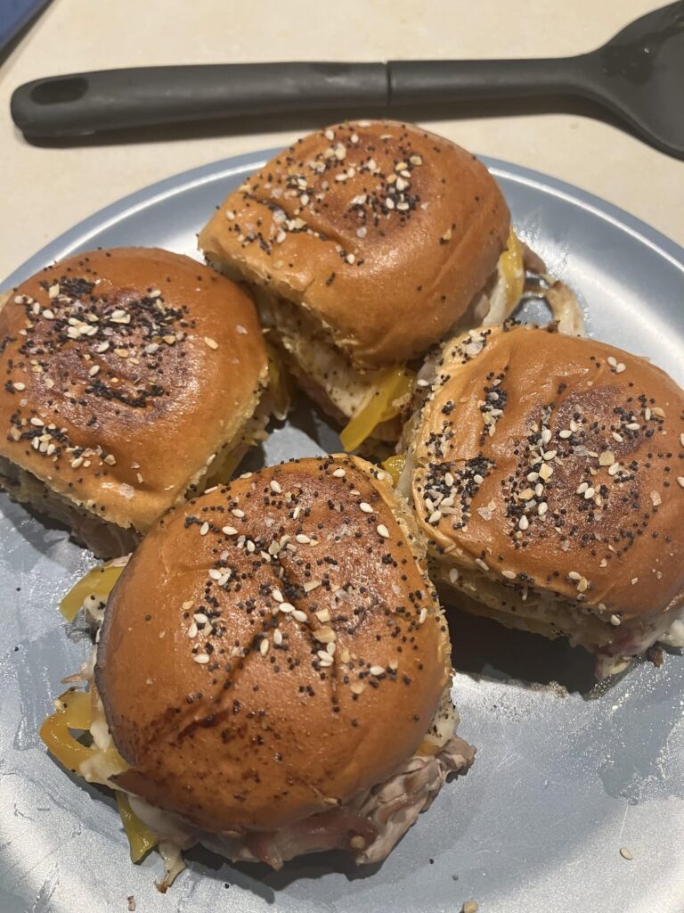 Clean out the fridge sliders.  Pork tenderloin with peppers, onions, provolone, mozz