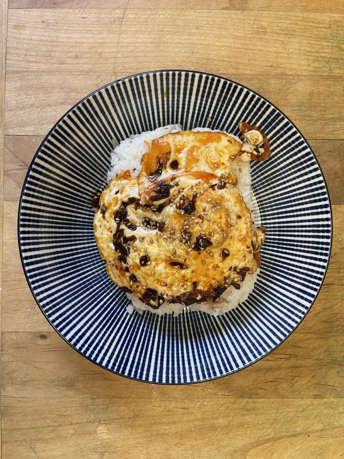 Was tired and lazy so went with my standby: chili crisp eggs over rice