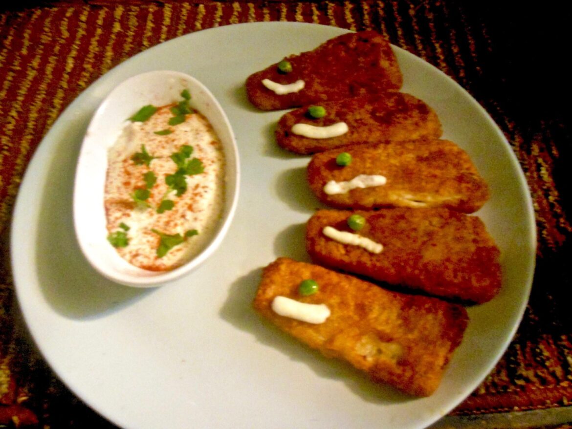 do you ever make goofy-looking meals for the little ones? Presenting a small school of fishies with pea-eyes and mozzarella-mouths swimming through the crystal-clear waters towards a lifeboat filled with tartar sauce.
