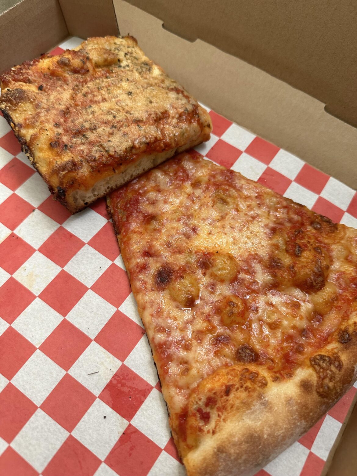 Heirloom Pizza: Vodka square slice that I used to hide the fact that I already took a bite of the cheese slice (both were amazing).