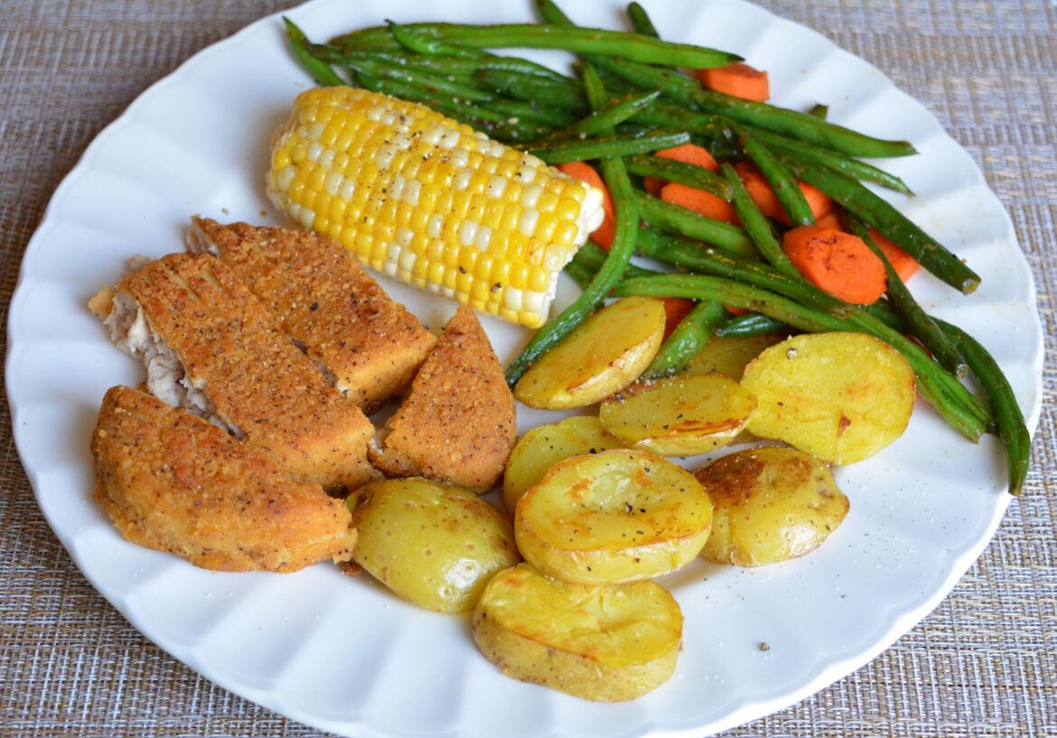 409 cal (26 g protein). Garlicky green beans & carrots, potatoes, Meati crispy cutlet, corn on cob. One of my favorite meals.