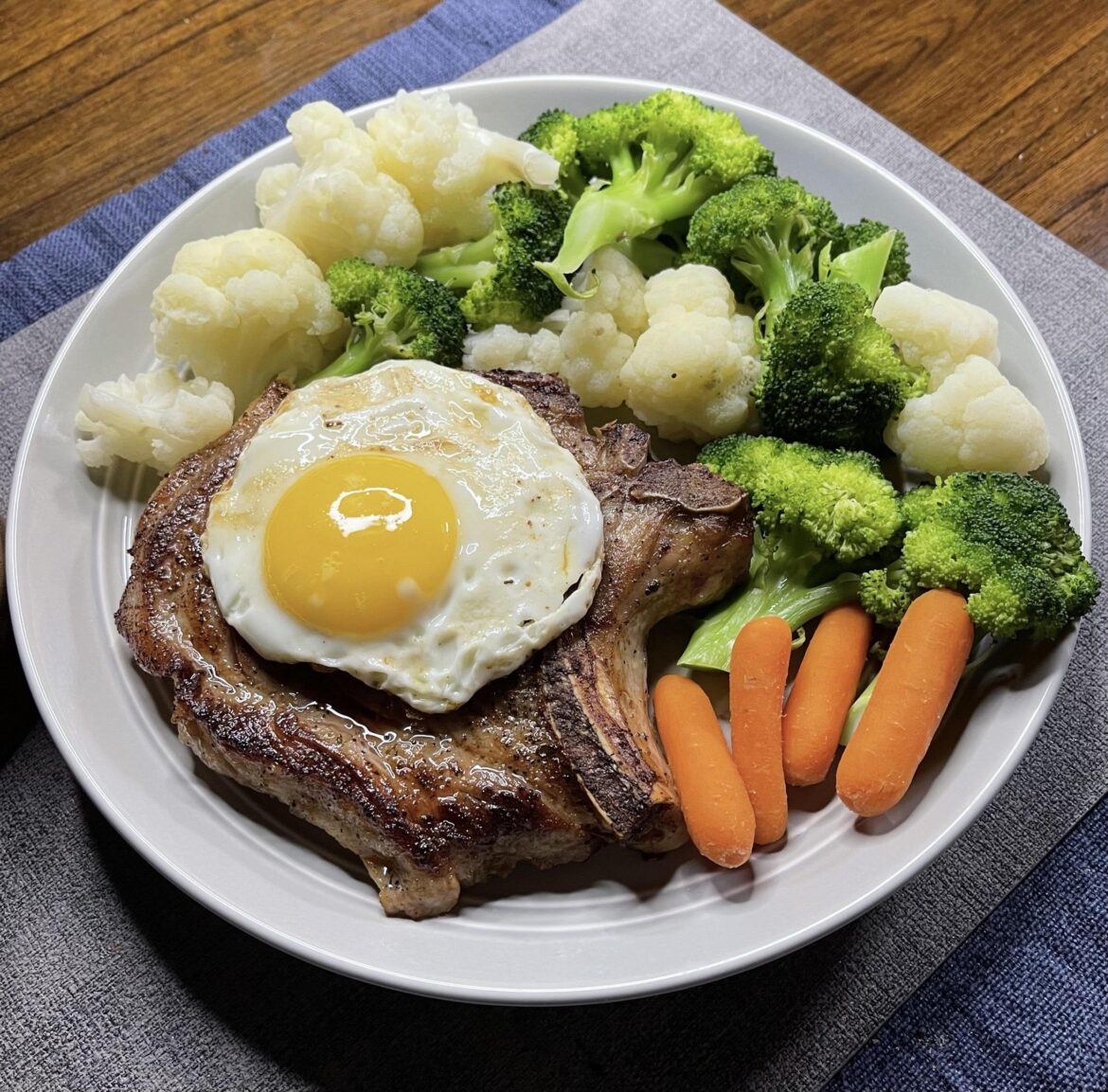 Ribeye Porkchop with Egg on it.