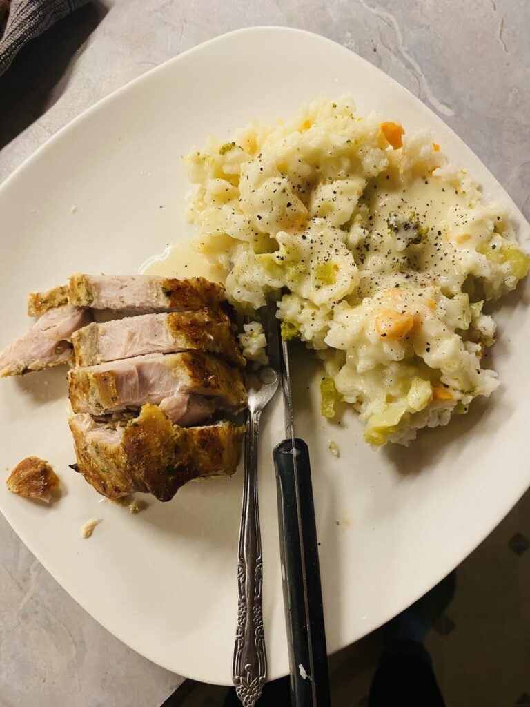 Pork loin and veg rice with smoked Gouda cheese sauce