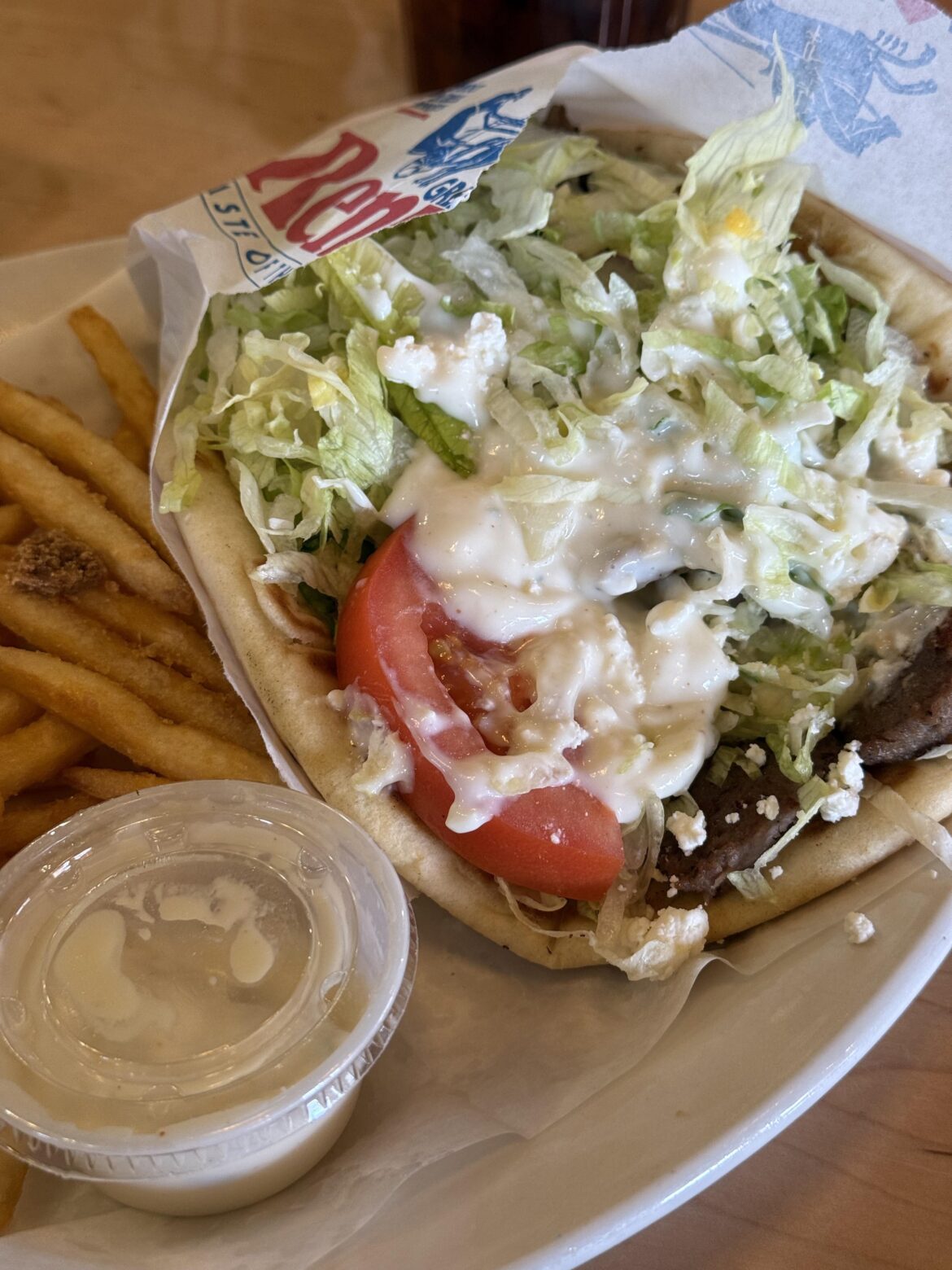 Had this amazing gyro ( geero or jiro ,, how ever you like pronouncing it ) .. with extra tzatziki sauce