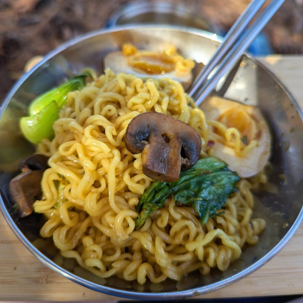 Nongshim shin gold chicken w. some veggies and soy sauce egg.