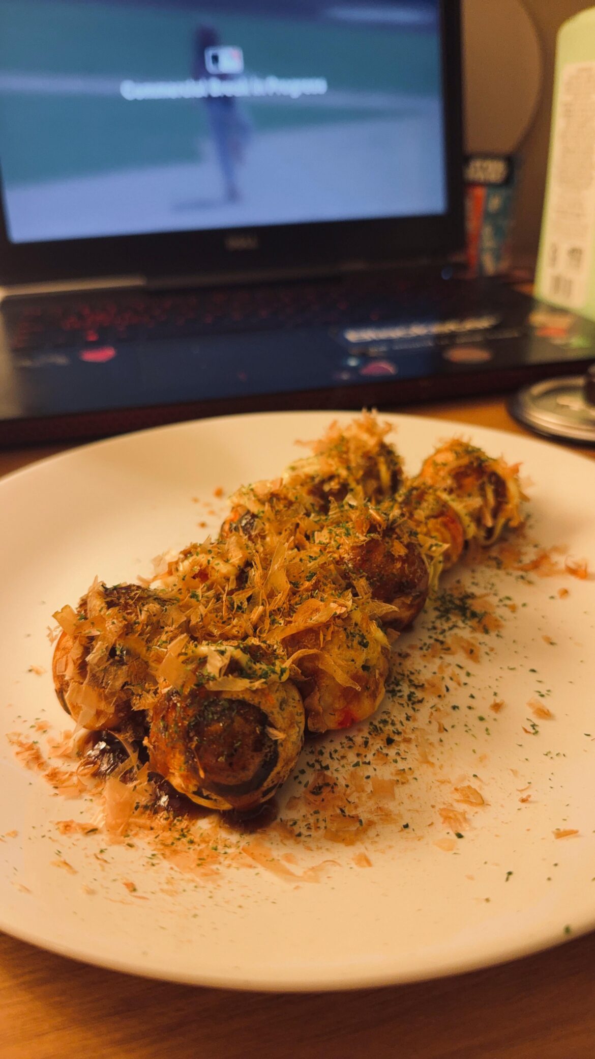 Enjoying some "takoyaki" while watching the World Series
