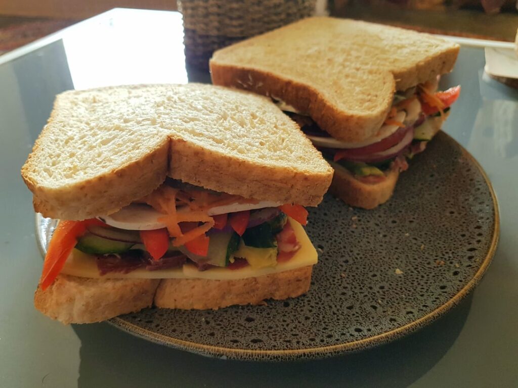 Lunch - Salami Cheddar Avocado and Salad on Wholemeal.
