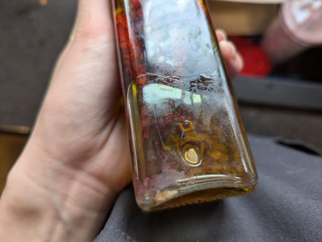 Garlic turned pink in cayenne infused oil. Garbage? :(