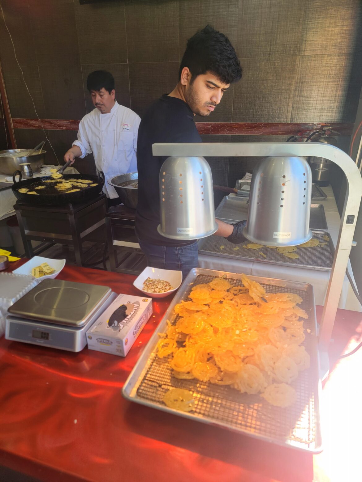 At Rasraj in Artesia / Little India: Making jalebi (Indian sweet) in preparation for the upcoming Navaratri & Diwali holidays