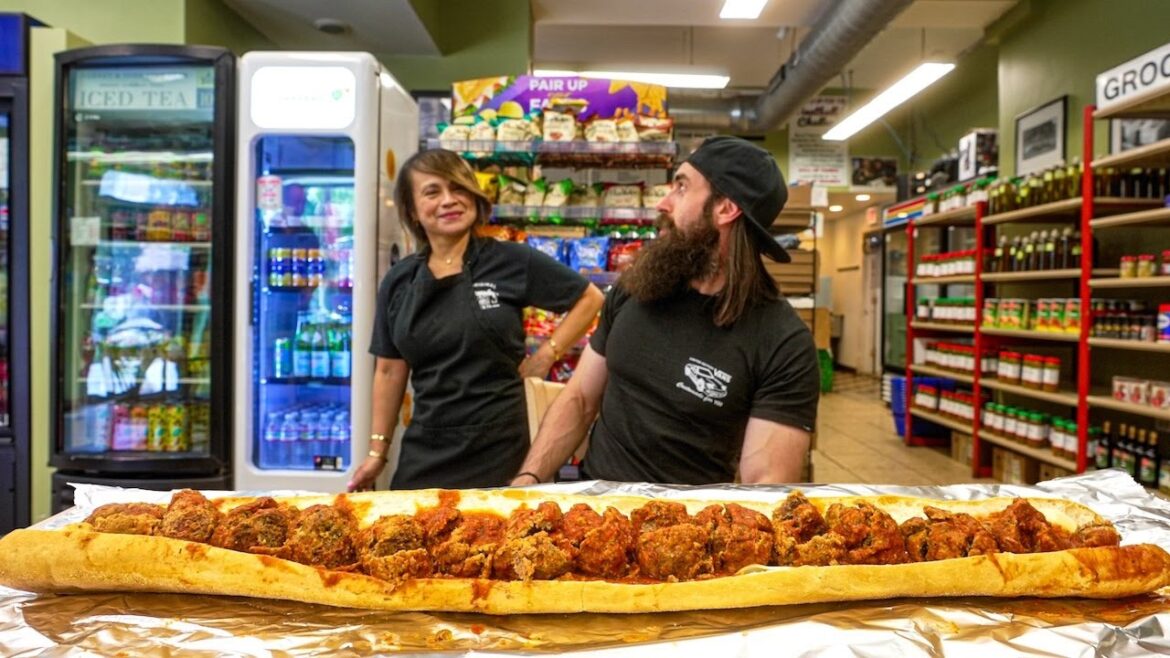 WIN $50 CASH IF YOU CAN FINISH THIS GIANT MEATBALL SUB IN CHICAGO! | BeardMeatsFood
