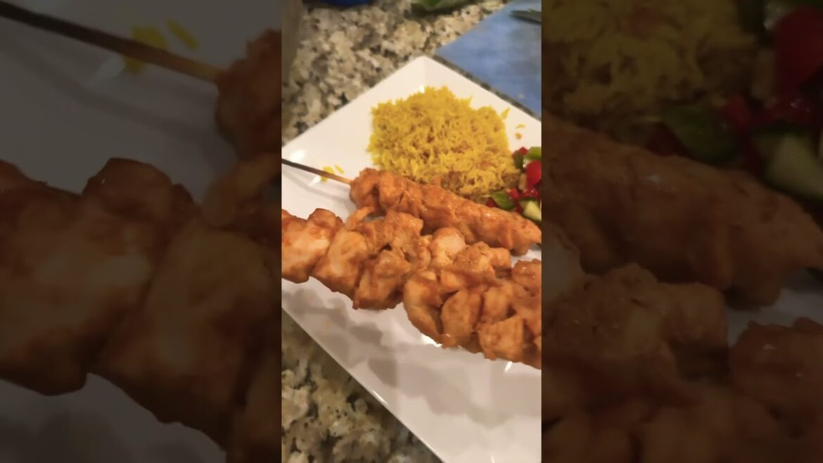 Delicious peanut butter chicken skewers with coconut yellow rice and Israeli salad! #food #baking