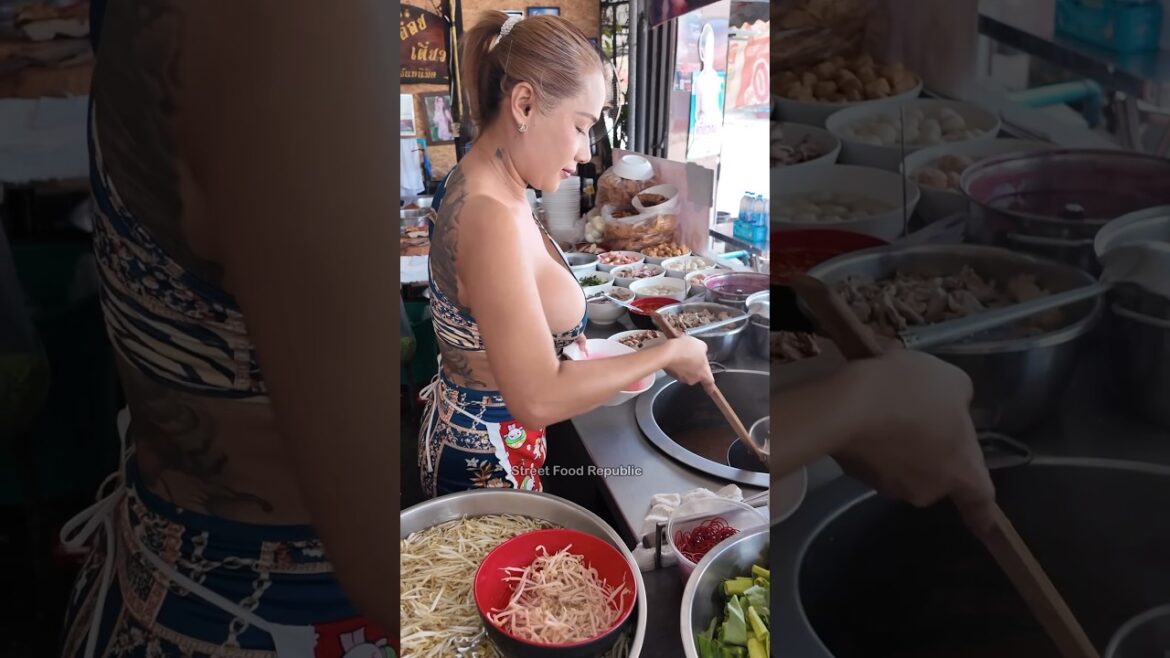 Beautiful Thai Lady Cooking Noodles -Thai Street Food Beautiful Thai Lady Cooking Noodles -Thai Street Food