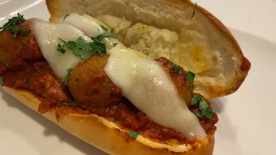 Sardine ball Bocadillo w/ chilindron sauce and manchego cheese