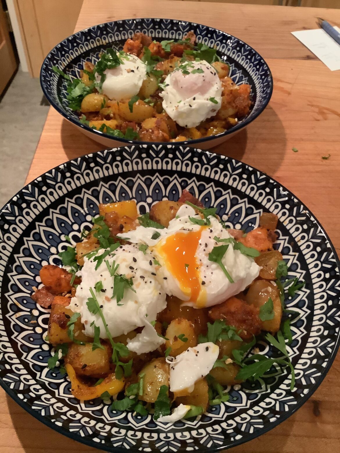 Clean out the fridge hash with poached eggs.