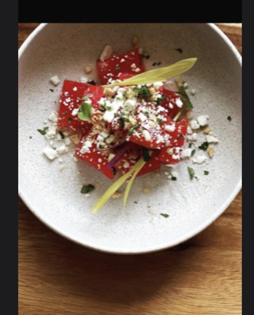 Aerated Pom juice compressed Watermelon | Pom Gastrique | French feta | micro cilantro | Corn shoots