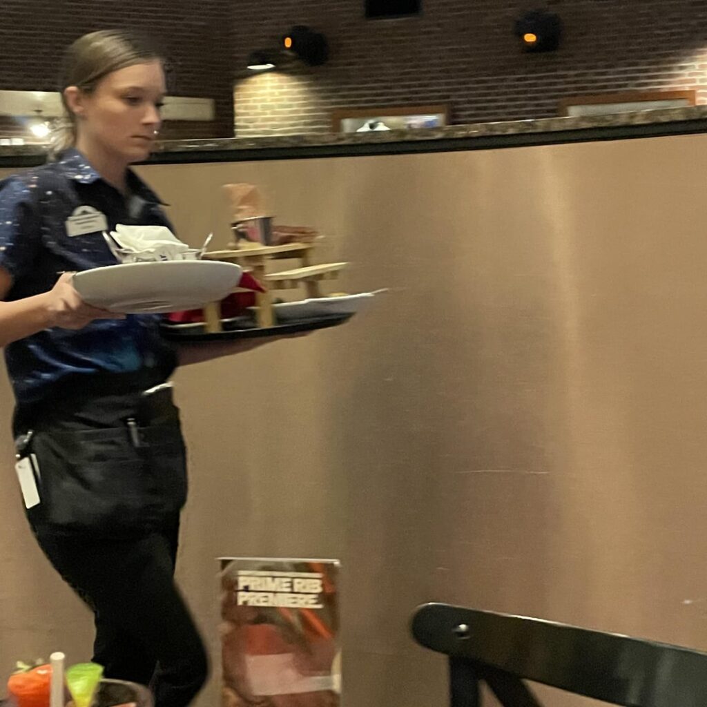 BBQ Ribs served on a miniature picnic table.