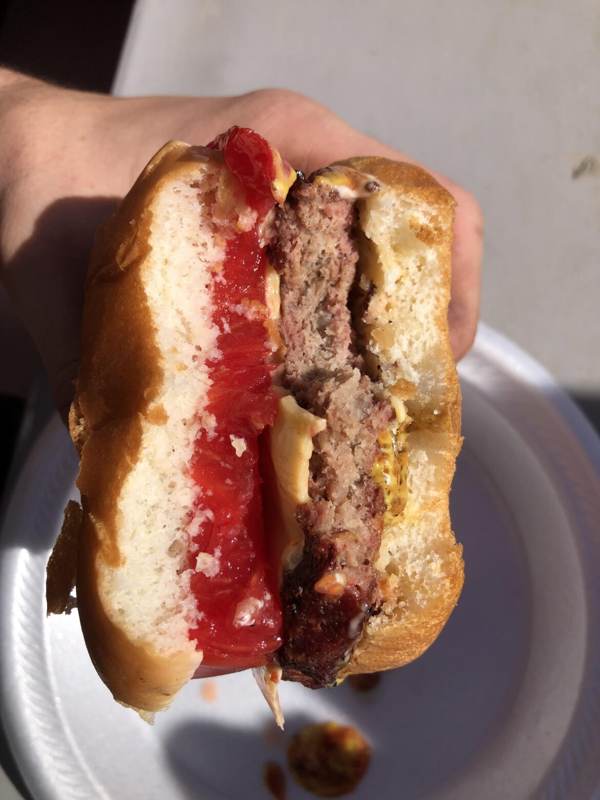 Burger, with a big slab of tomato