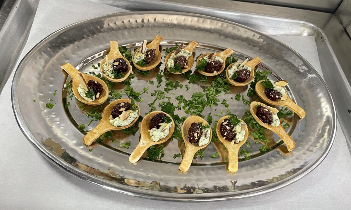 crisp spoon, herbal goat cheese, balsamic grape, toasted almonds, and parsley~