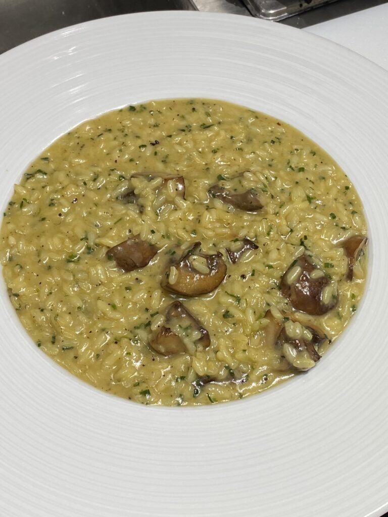 Osso bucco on saffron risotto with chimichurri