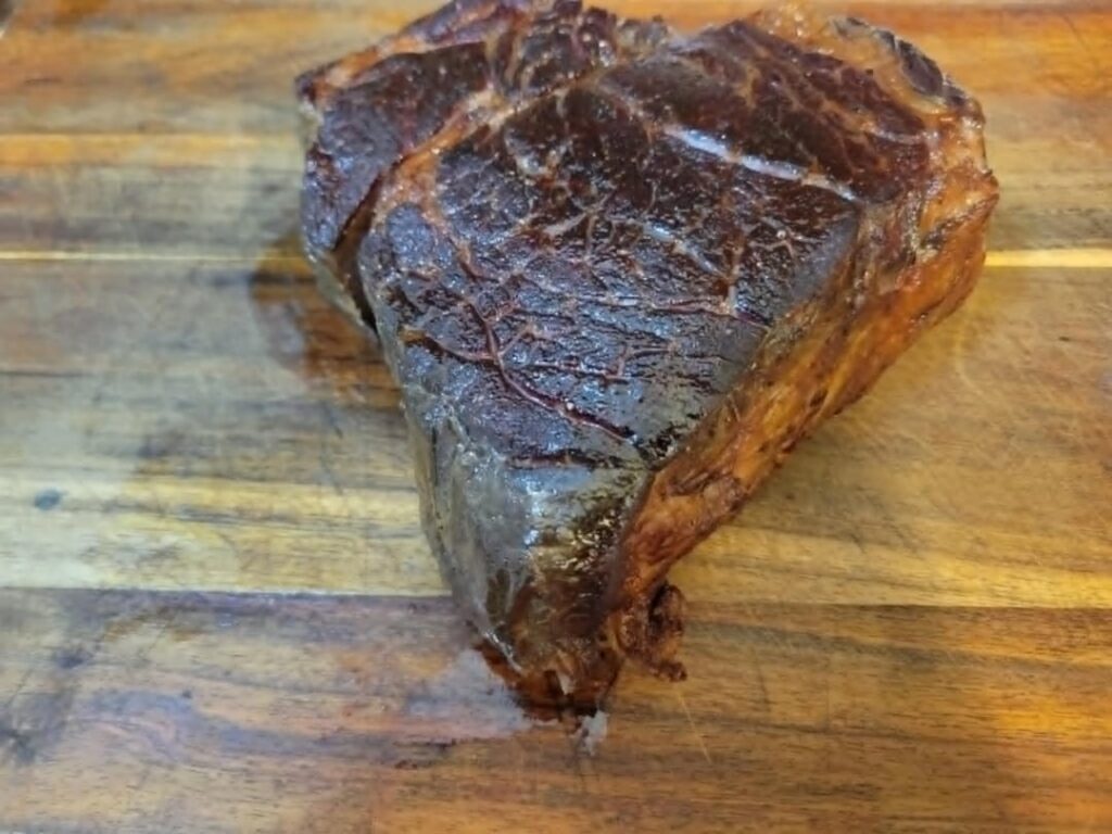 My first Sir Charles. 22hrs at 138, ripping hot cast iron with grapeseed oil. Made a little onion gravy thing with the bag juices. Served with fresh Aroostook county yellowflesh potatoes and bacon and balsamic brussels sprouts.  Bangin'.  I can't believe this is a $5.99/lb cut of meat.