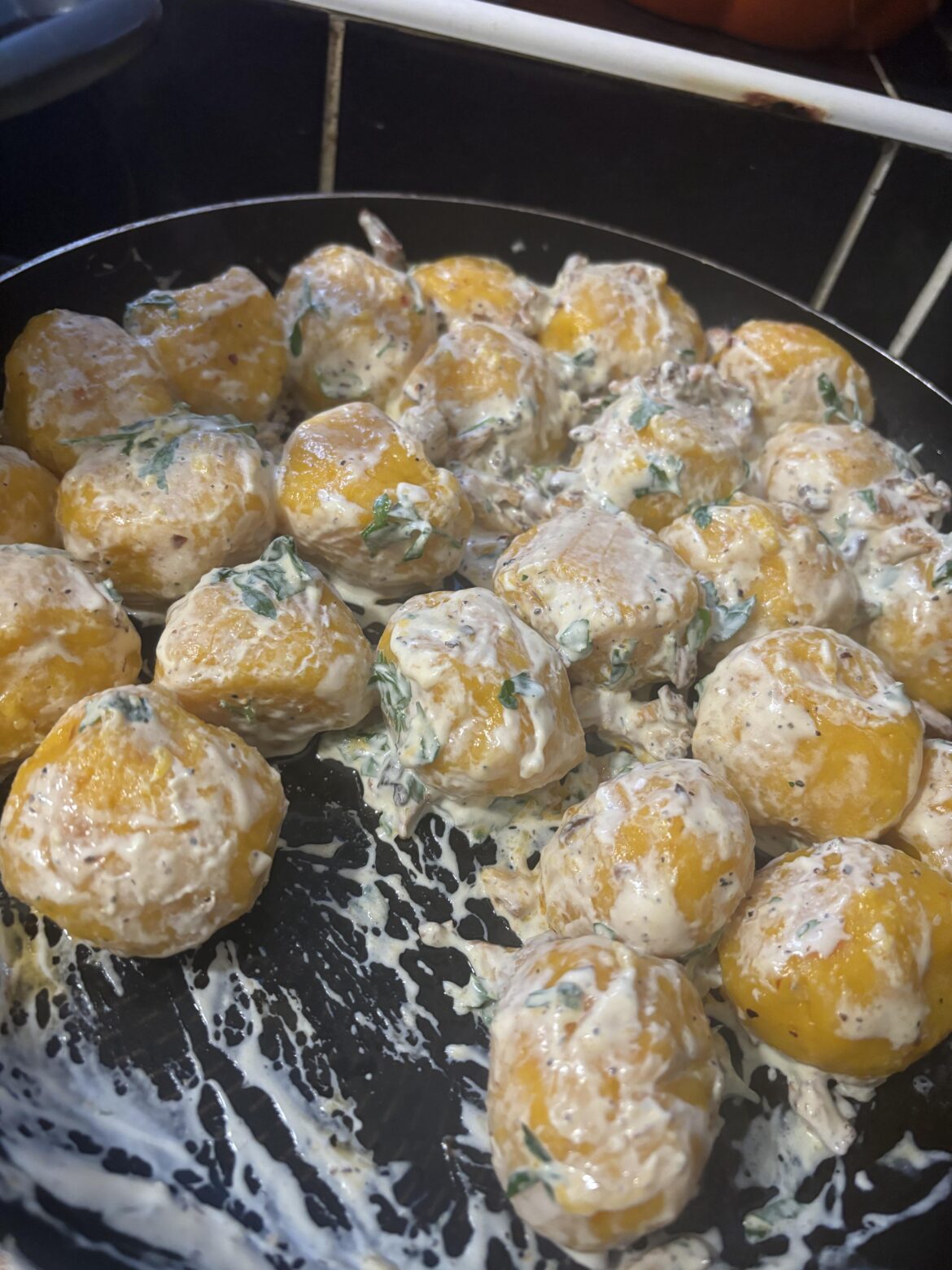 Pumpkin dumplings with creamy chanterelle and goats cheese sauce