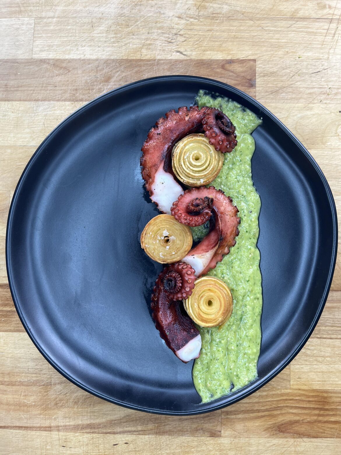 Charred Octopus & Rolled Potatoes on Avocado Salsa