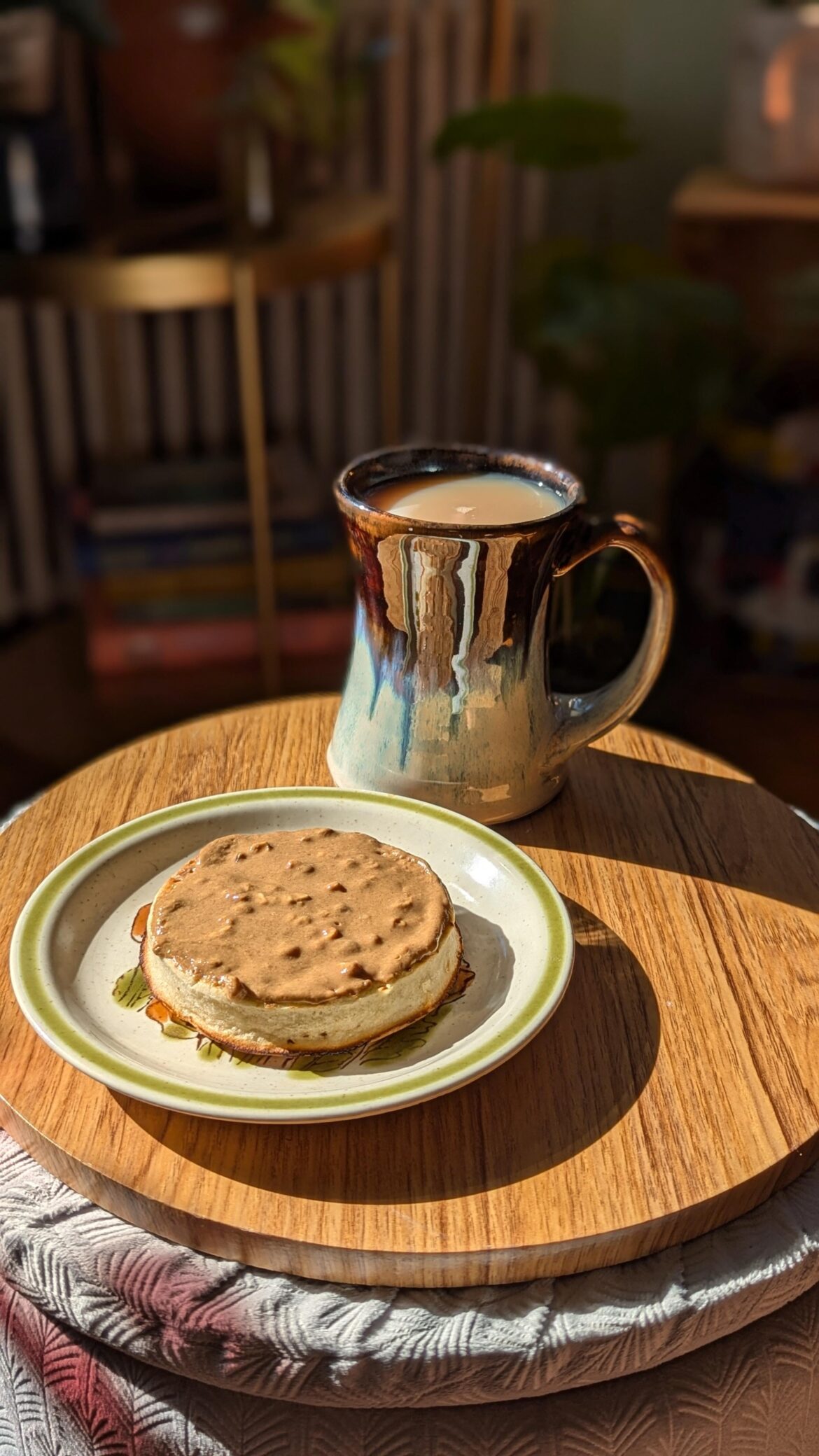Afternoon crumpet with peanut butter and a cuppa.