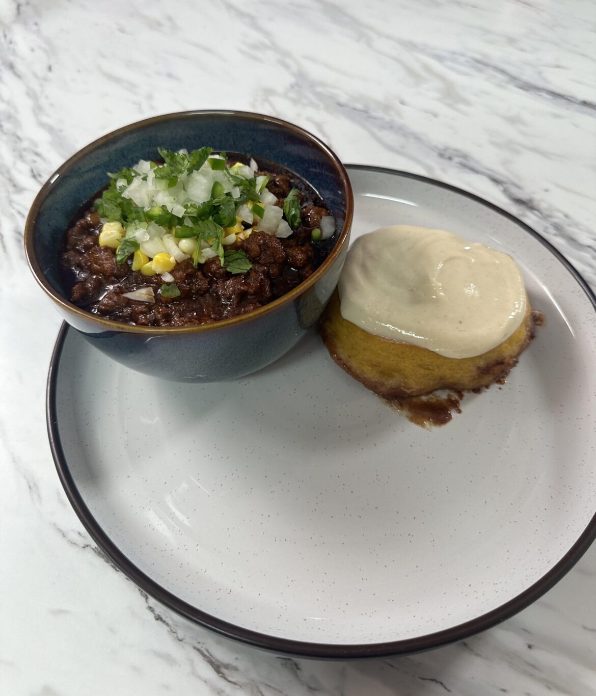 Texas style chili and pumpkin spice cinnamon rolls with a maple cream cheese glaze