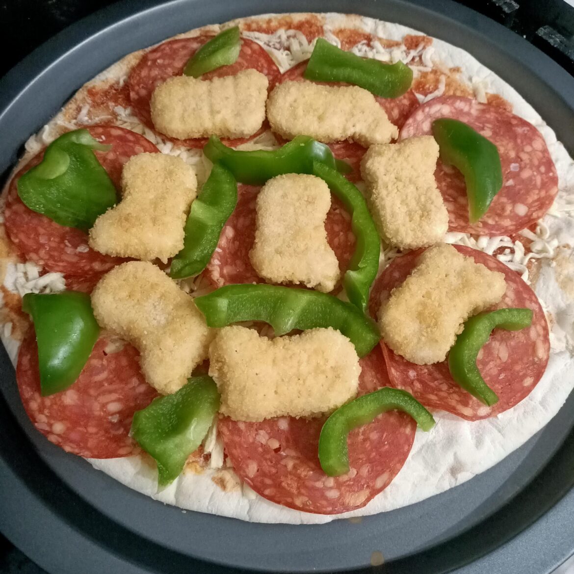 Got told to post my chicken nugget pizza here