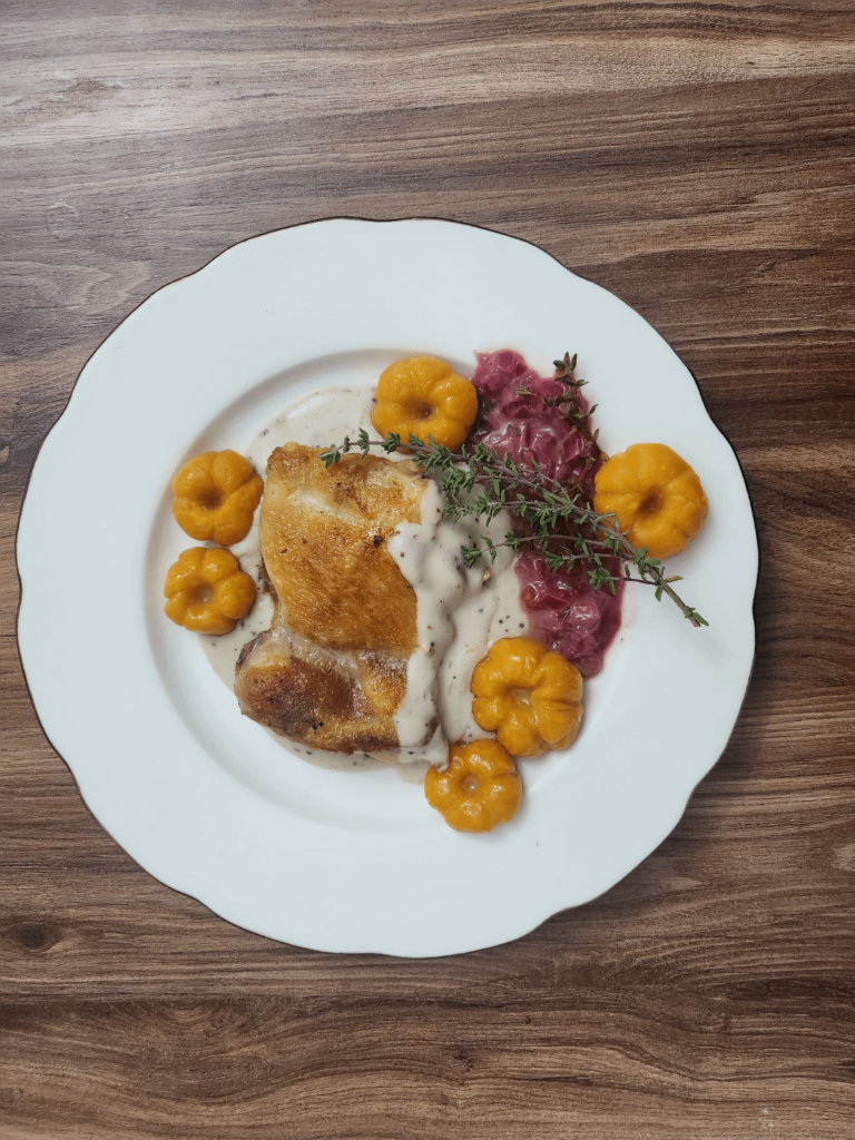 Chicken thigh, infused bachamel, red onion raspberry sauce, pumpkin gnocchi and a lil thyme