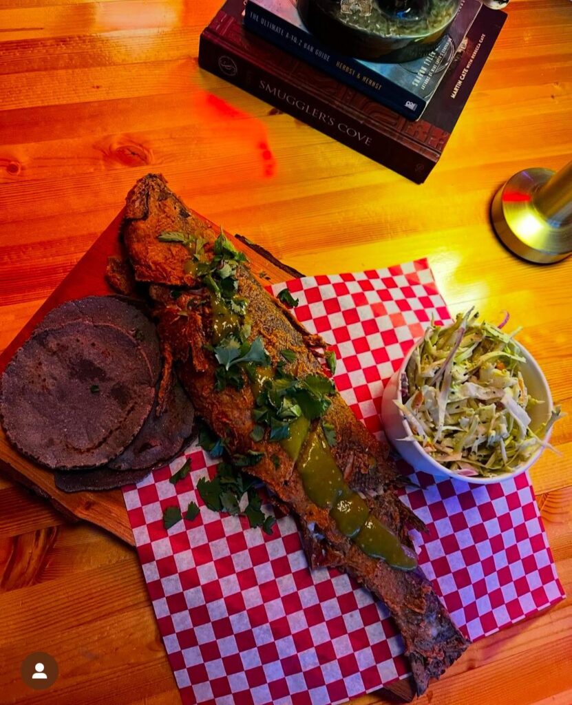 This half a fish on some wood