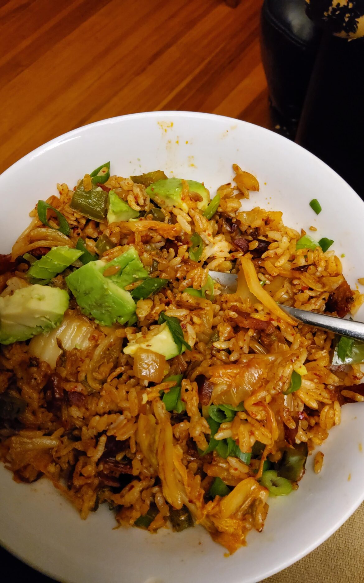 Used what I had in the fridge to make kimchi bacon fried rice for dinner. Top with avocado before it went brown.
