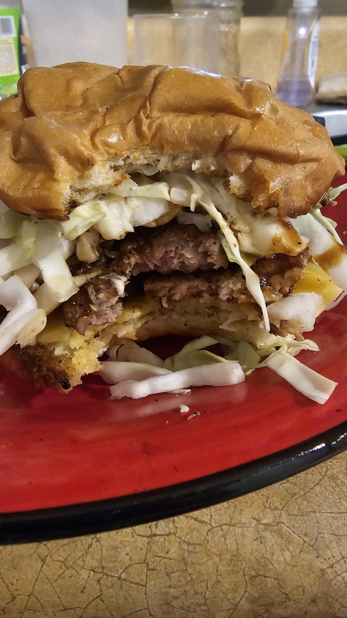 Pork loin, gouda, kewpie mayo, katsu sauce, and shredded cabbage, on a mayo-griddled bun