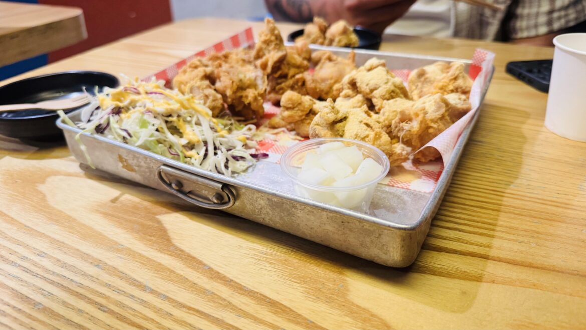 Fried chicken served in a metal tray