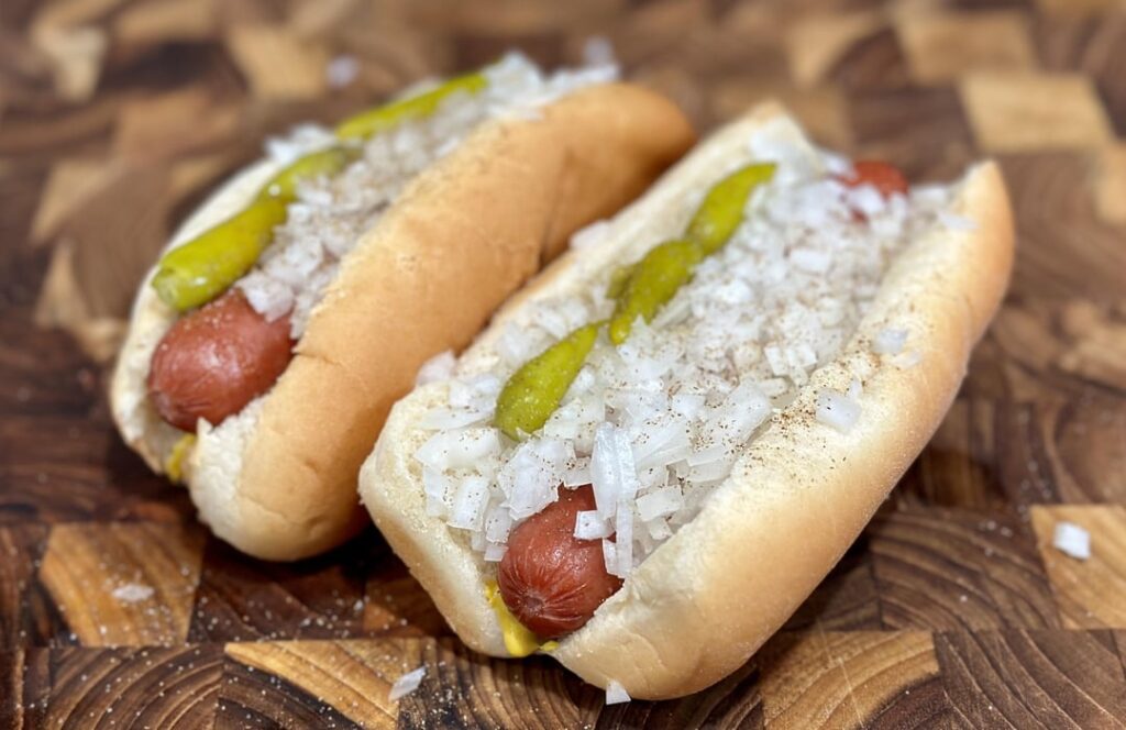 searching my phone for “sausage” produced 330 photos. here are some of them that have onions on them.