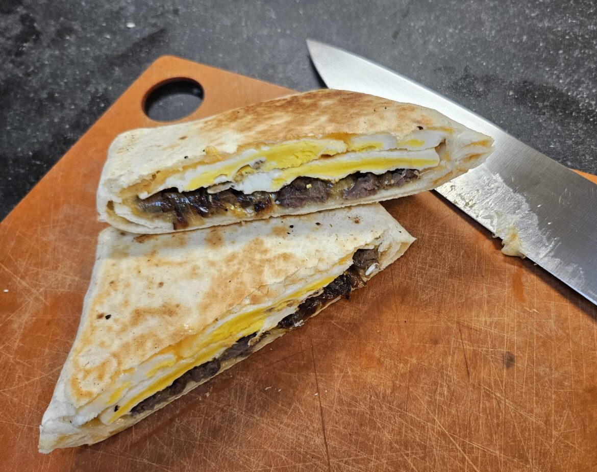 Steak, egg, and cheese crunchwrap style