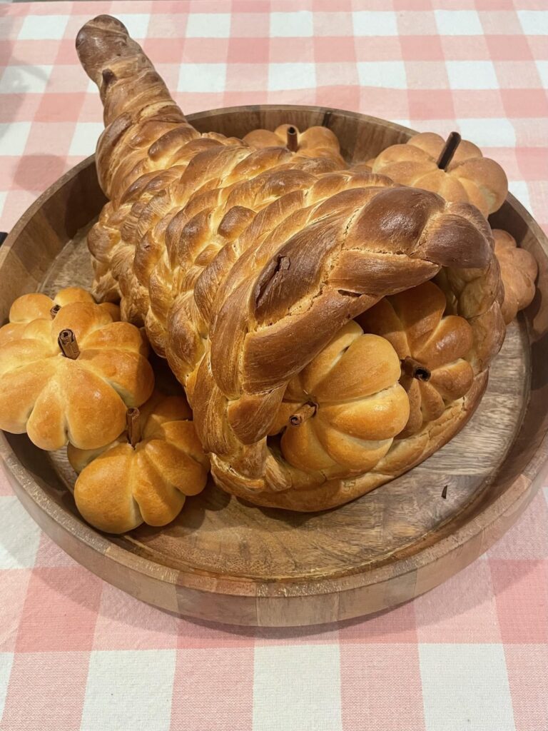 challah cornucopia filled with milk bread pumpkins