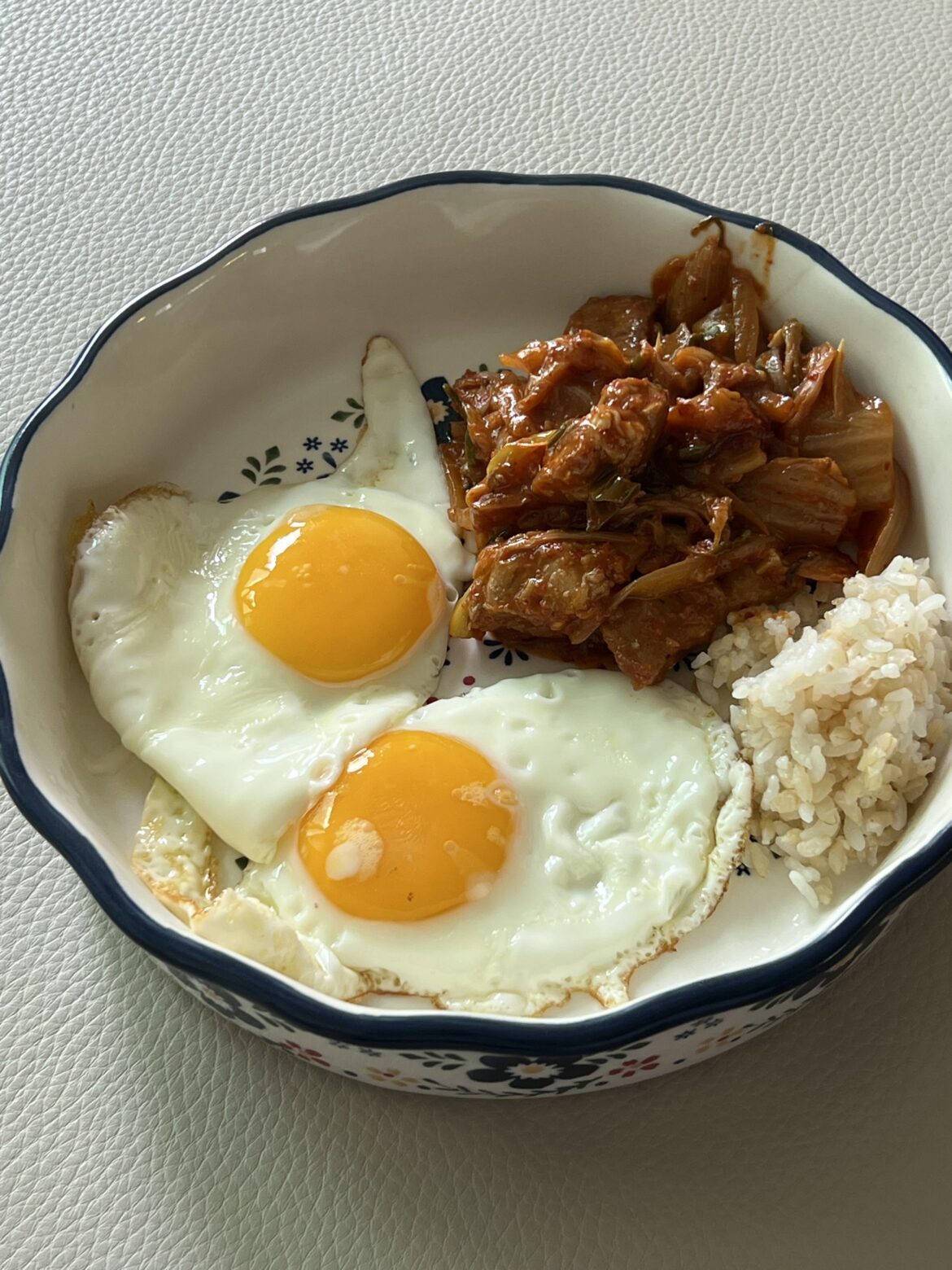 Sunny side eggs and fried Kimchi