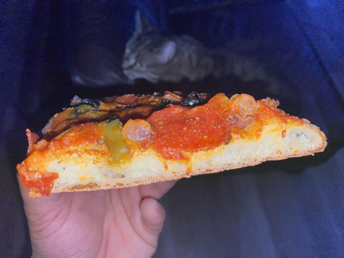 When did stuffed crust change from cheese backed into the crust to just thicker dough?