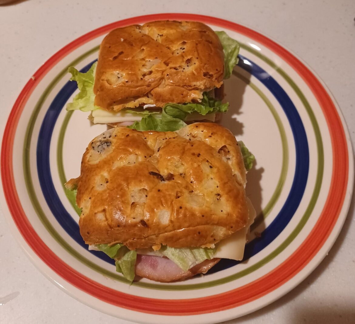 Ham, Swiss, Lettuce, Tomato & Duke's on an Onion Roll X 2.