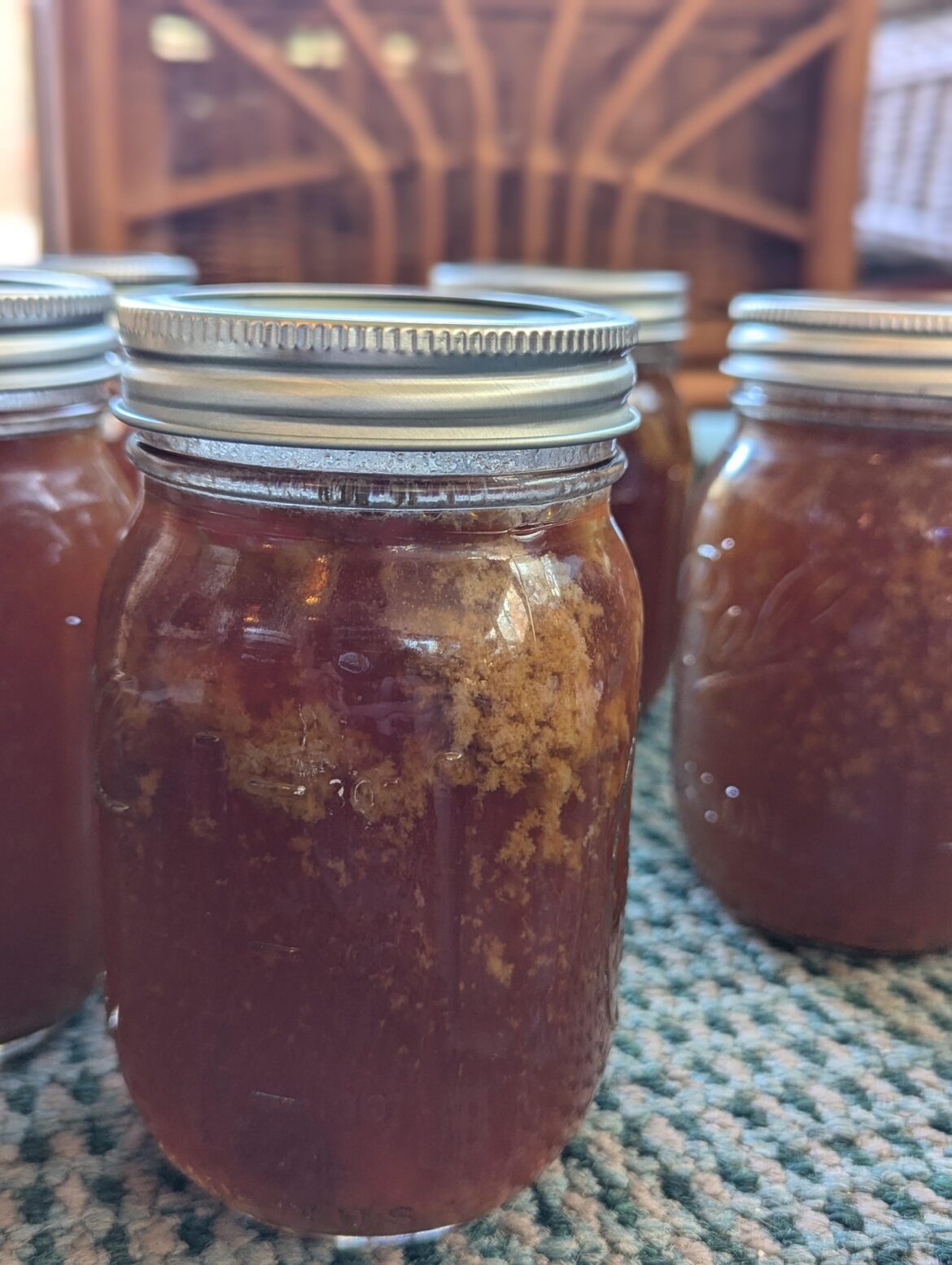 First time ever canning, homemade bone broth. Pulled them out with what I think is residual fat. Will this be of concern?