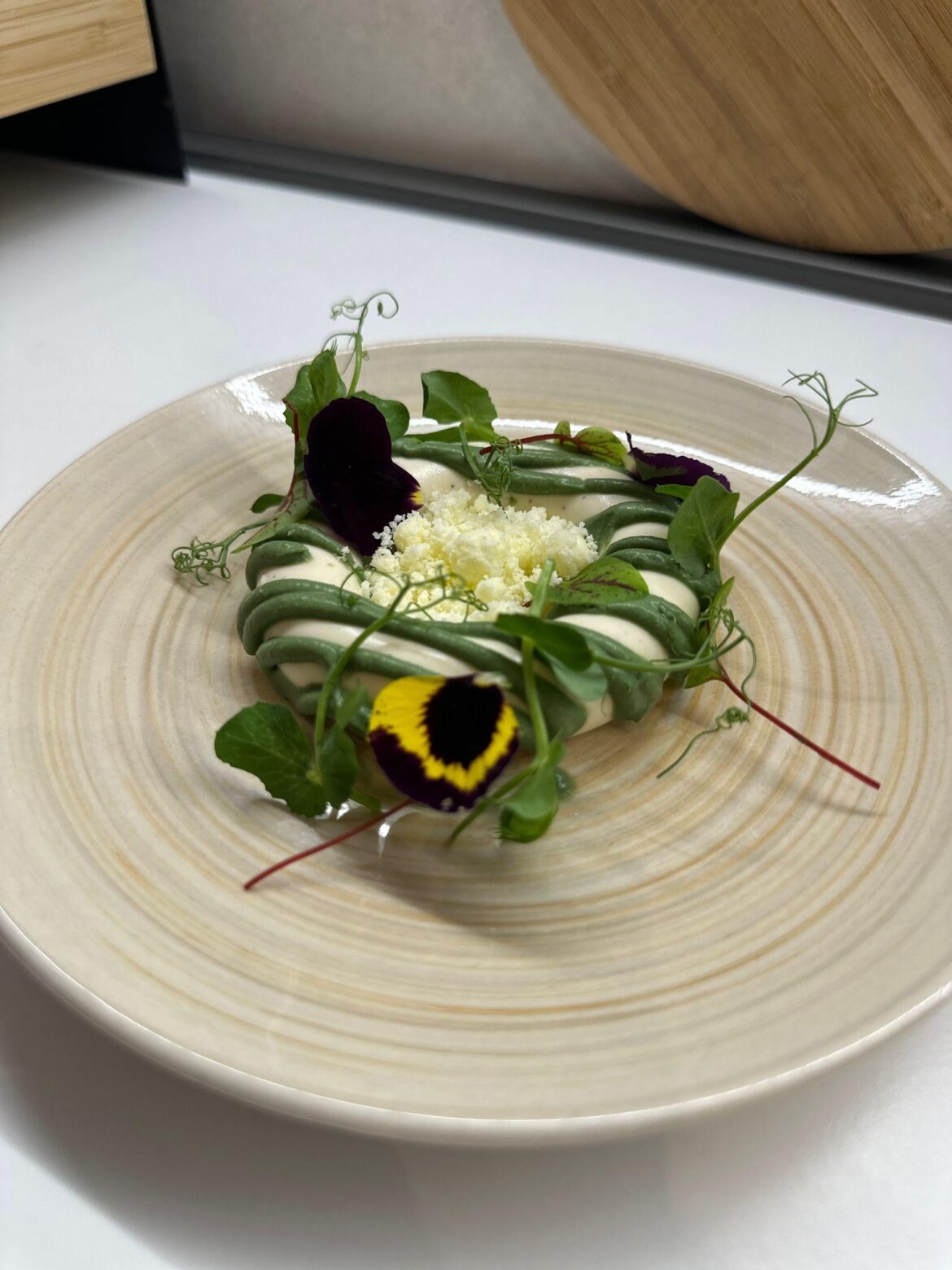 Wild herbs and straw infused panna cotta, extra virgin olive oil powder, seaweed and tonka bean cream