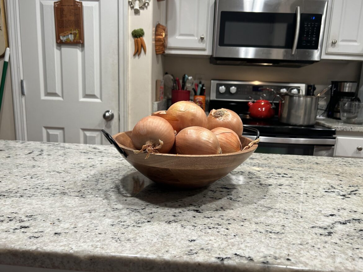 My onions in their place of honor on my kitchen island
