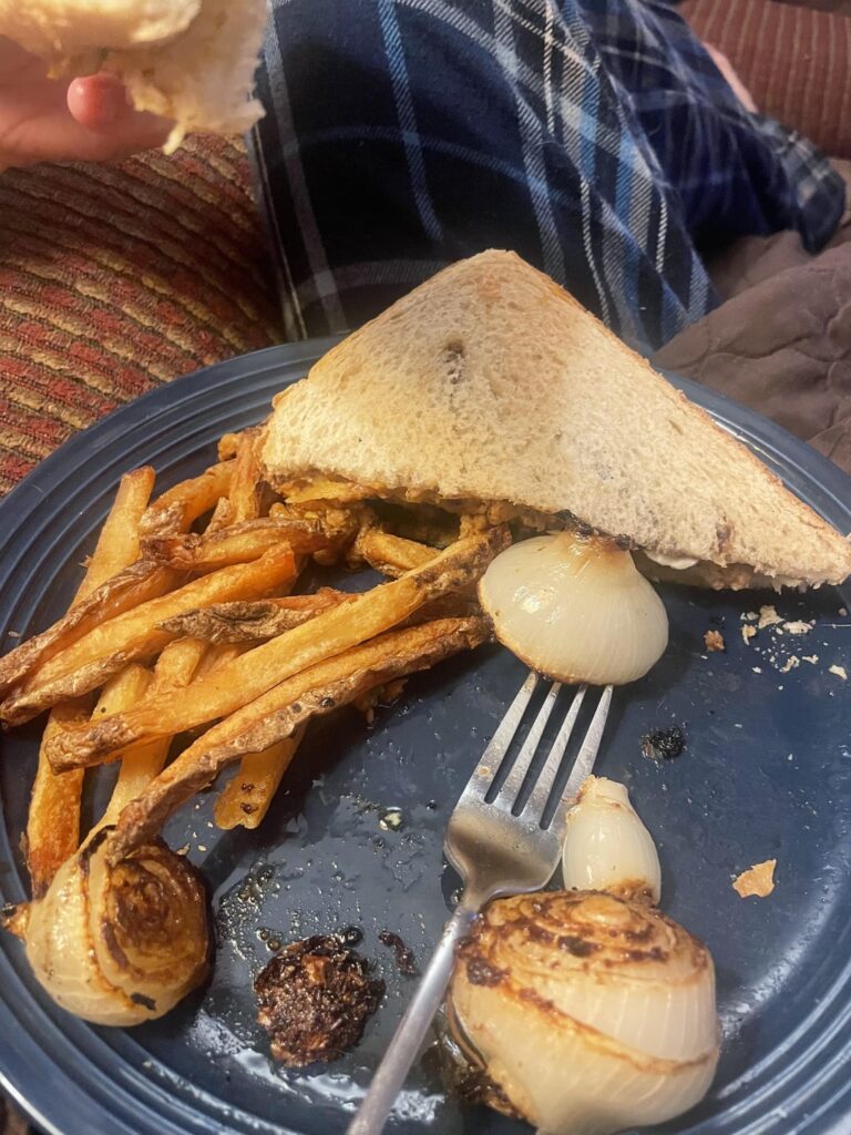 Roasted onion, chicken sausage roasted in chili crisp oil, olive oil roasted fuyu persimmon and brie on sourdough with balsamic glaze.