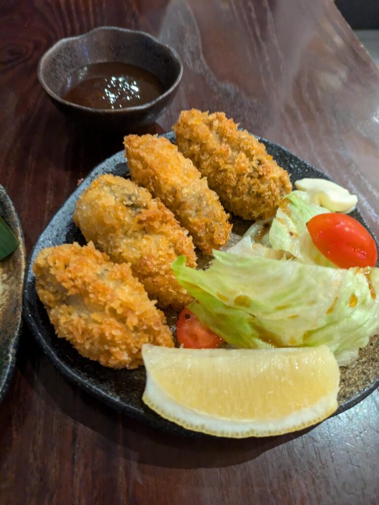 Went to an Izakaya – pictures are deep fried oysters (pic 1), monkfish liver, mackerel sashimi, yellow tail sashimi, and the oysters again (pic 2), then the food and drinks menu Went to an Izakaya - pictures are deep fried oysters (pic 1), monkfish liver, mackerel sashimi, yellow tail sashimi, and the oysters again (pic 2), then the food and drinks menu