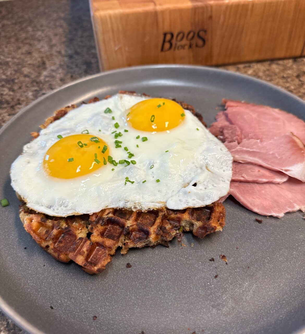 Stuffing waffle with some eggs for breakfast