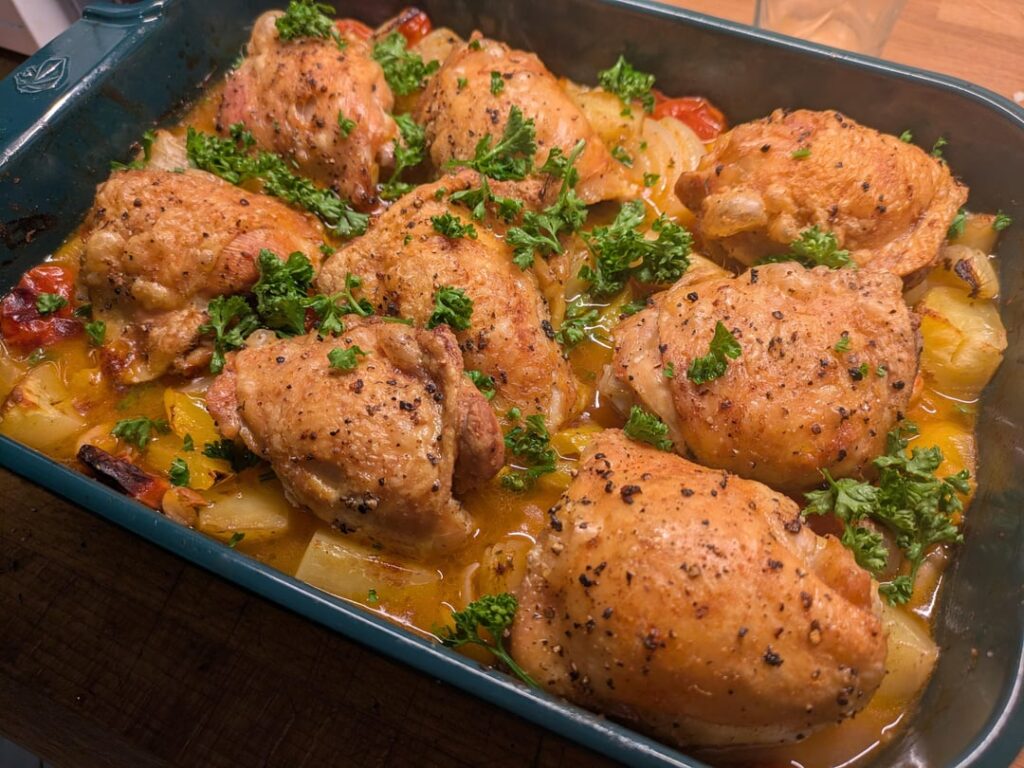 Crispy chicken thighs with beans, potatoes and chorizo