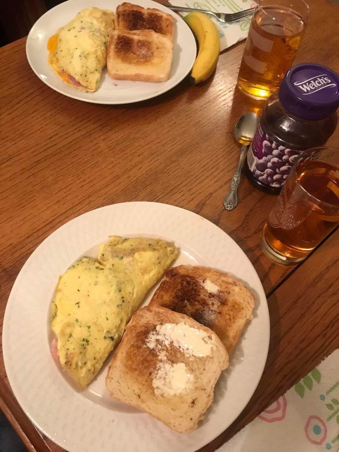 yummy ham and cheese omelet served with apple juice