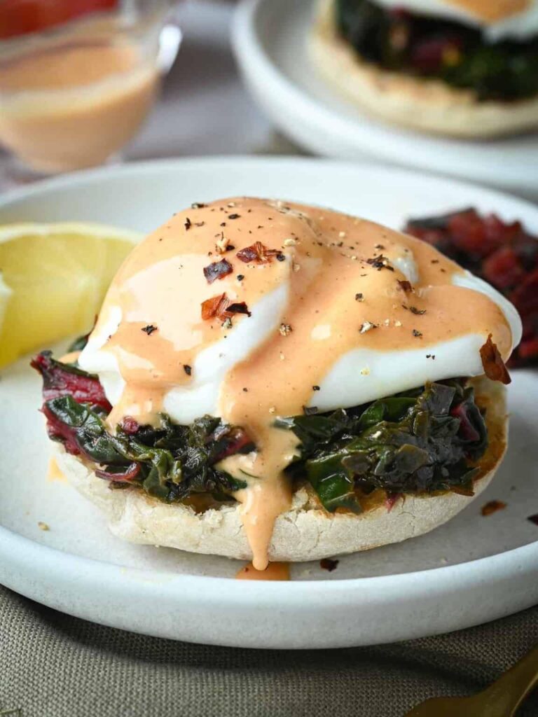 Classic Eggs Florentine  a perfectly poached egg and rich tomato hollandaise