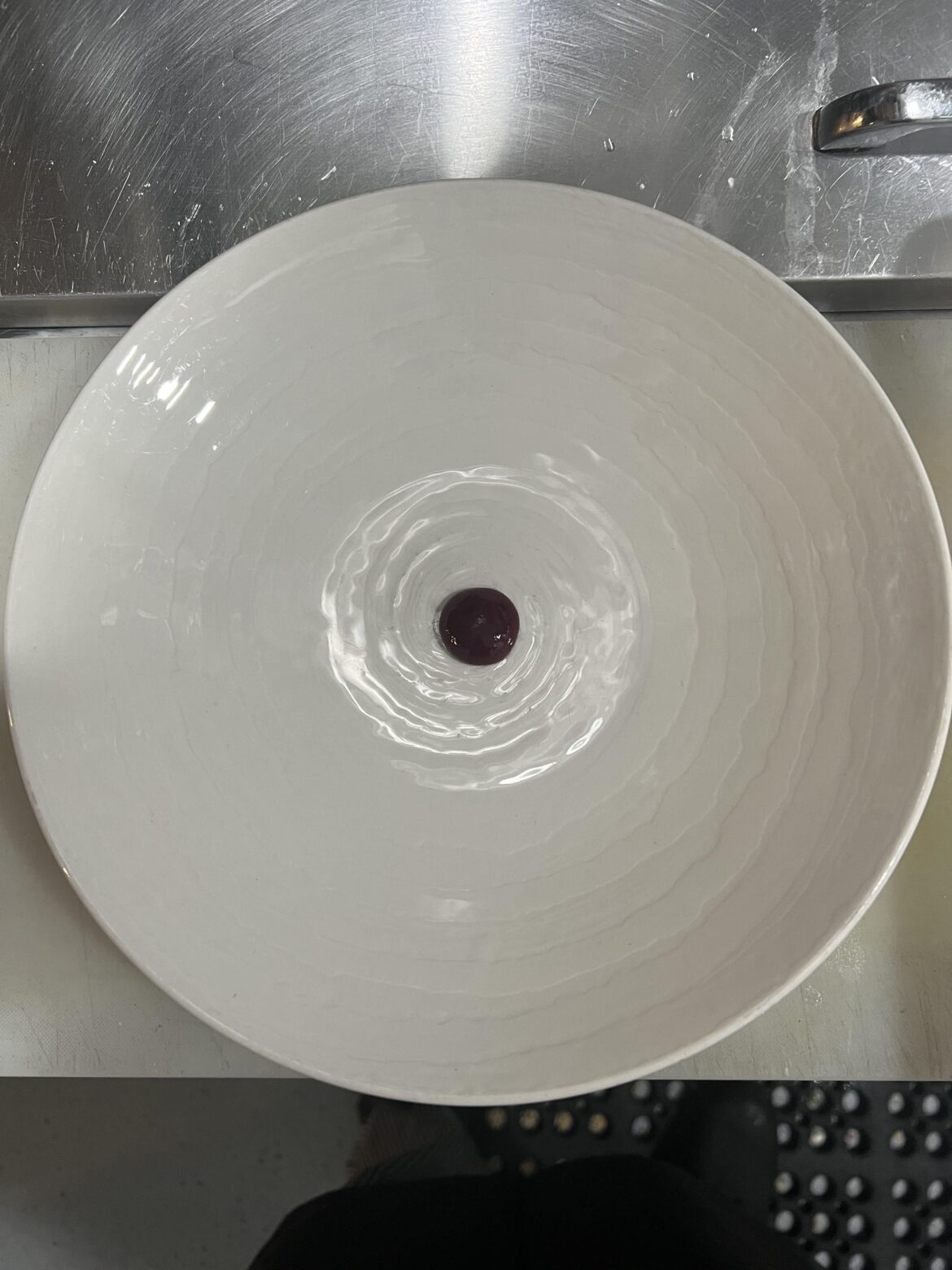 A single dot of Mixed Berry Coulis